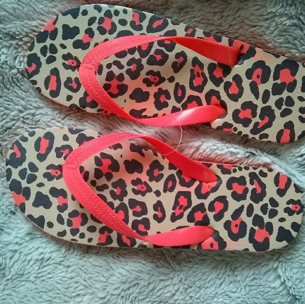 Orange leopard flip flops